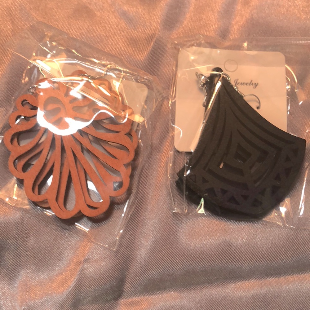 New. Two pairs. African wood earrings. Large.